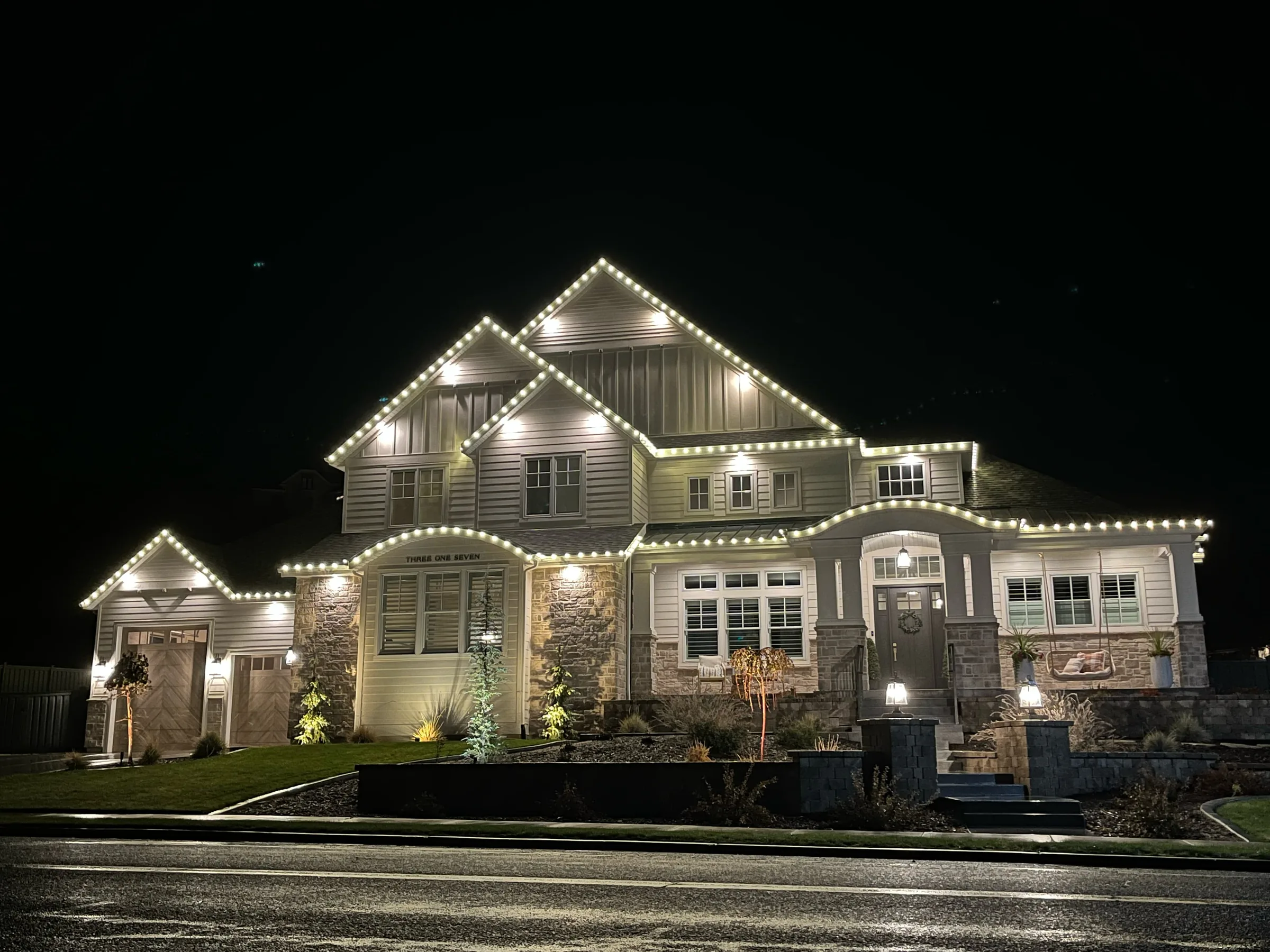 Two-story craftsman home with every gable outlined