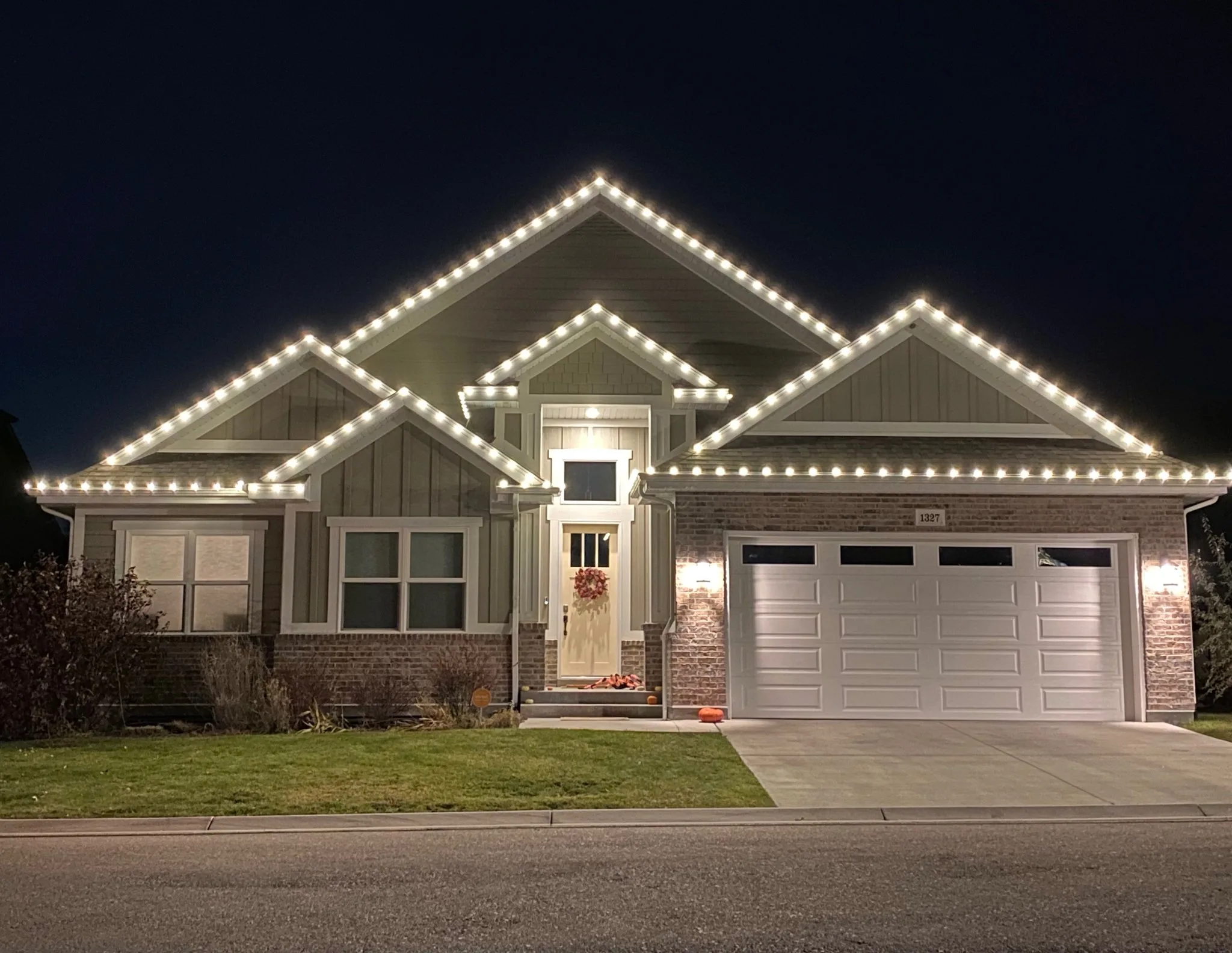 Craftsman home with every gable outlined in white