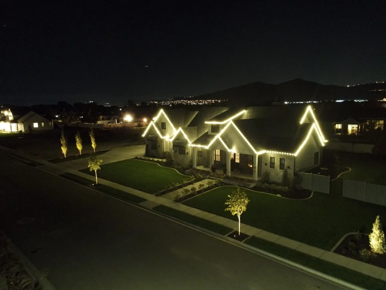 Drone view of the same ranch home from the street side