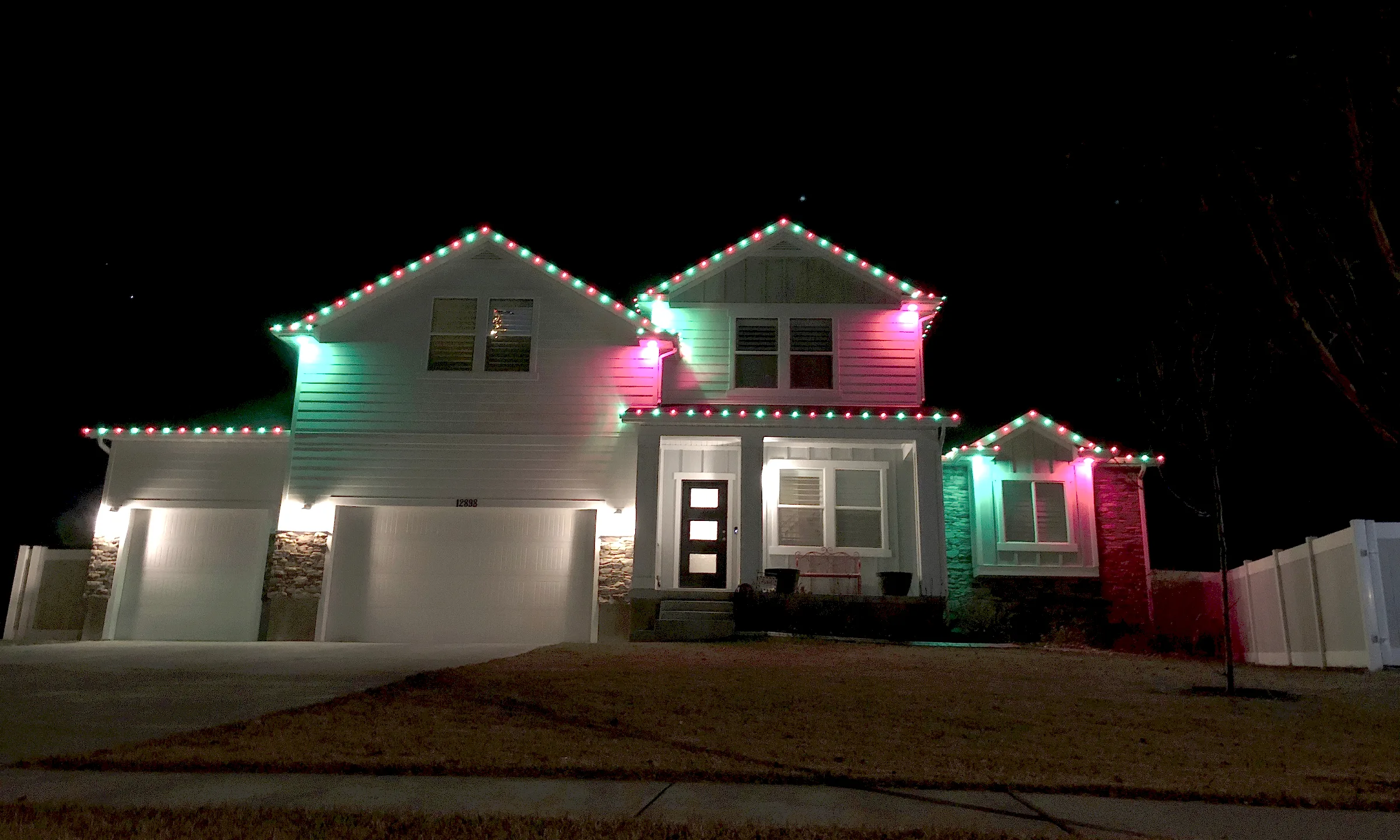 Modern home lit in pink and green
